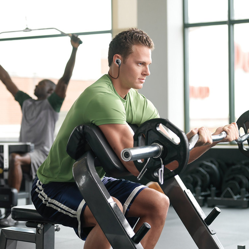 Illustration for article titled The wonderful world of cheap bluetooth headphones photoshopped onto stock photos of people exercising